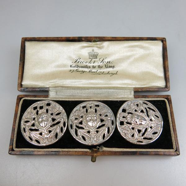 Appraisal: Three Levi Salaman English Silver Art Nouveau Style Buttons Birmingham