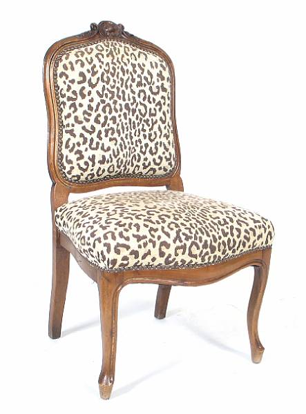 Appraisal: A Louis XV style walnut fauteuil and similar chair height