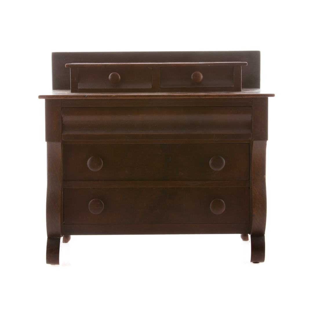 Appraisal: American Restoration miniature mahogany chest circa miniature deck-top three-drawer chest