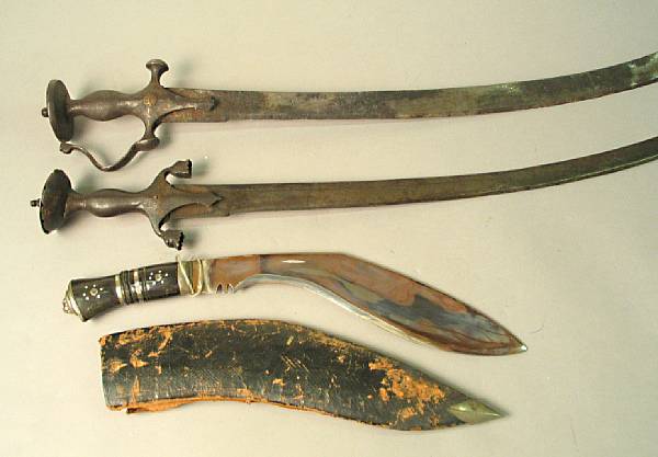 Appraisal: A lot of two tulwar and one kukri Comprising Tulwar