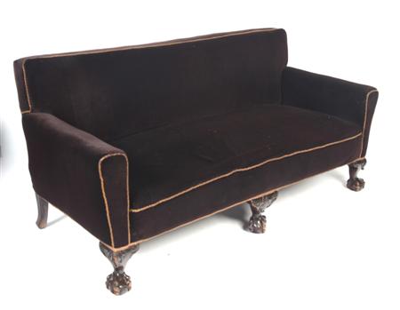 Appraisal: A late th century brown velour and gold beaded sofa