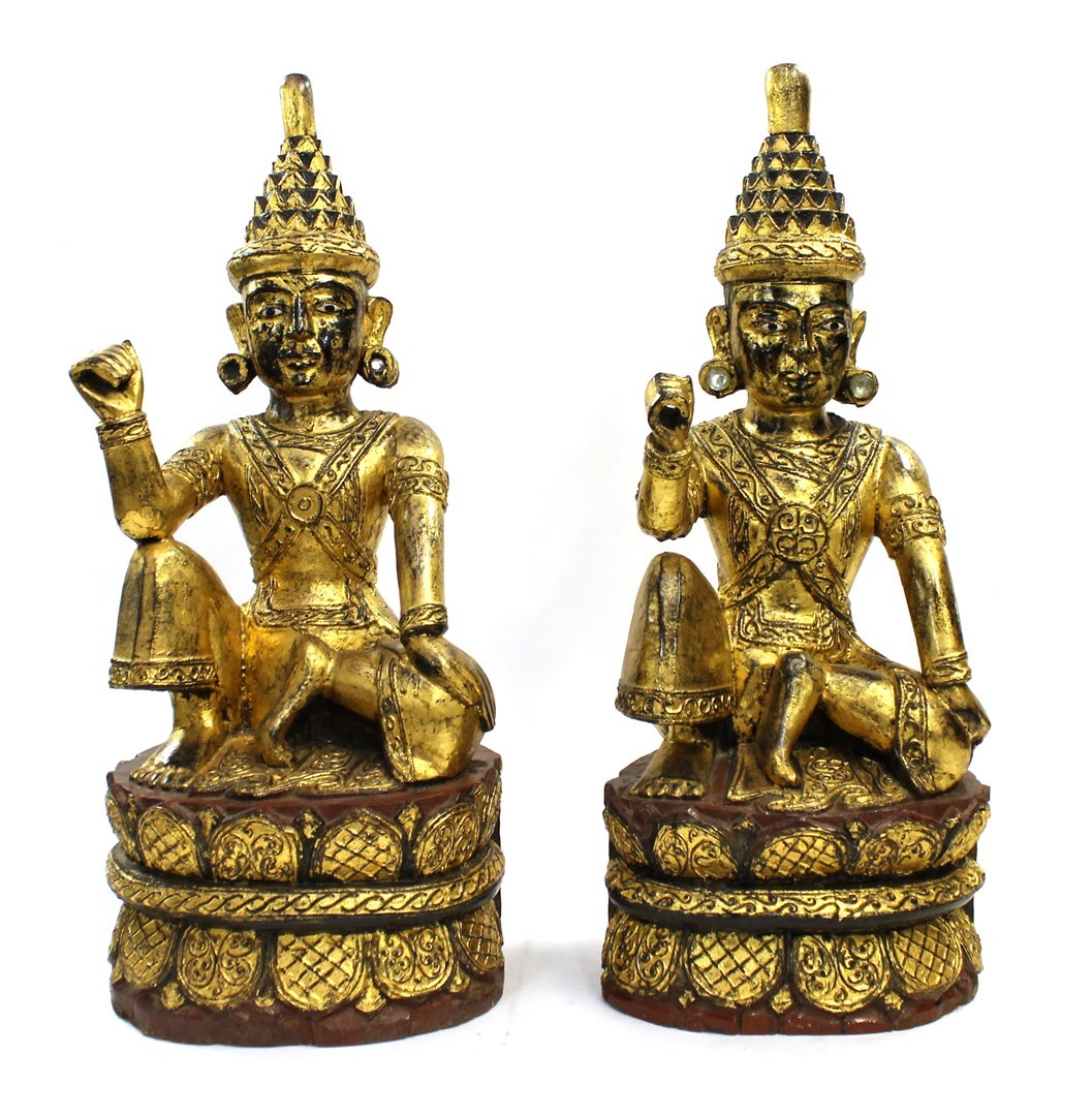 Appraisal: A pair of Thai giltwood figures of dancers seated on