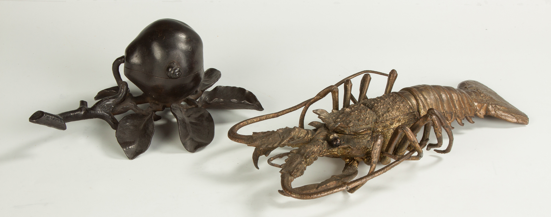 Appraisal: Patinaed Iron Inkwell Brass Lobster Stamp Box Peach with snail