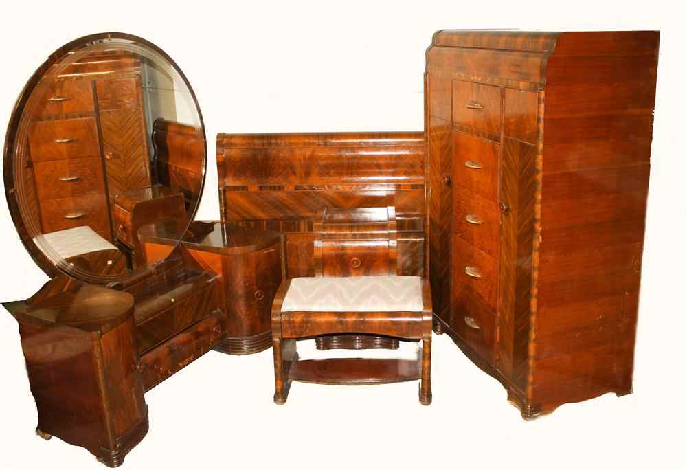 Appraisal: ART DECO MAHOGANY BEDROOM SUITE includes dressing table with side