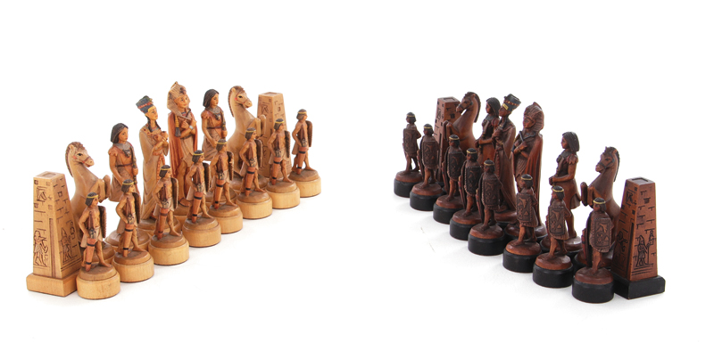 Appraisal: Italian polychrome-carved wood chess pieces by Anri circa complete set