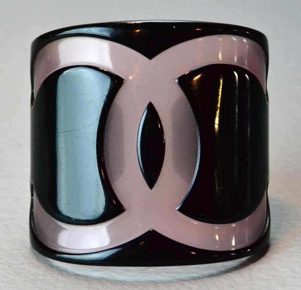 Appraisal: Chanel Bangle Cuff In Pink And BlackIn hard plastic or