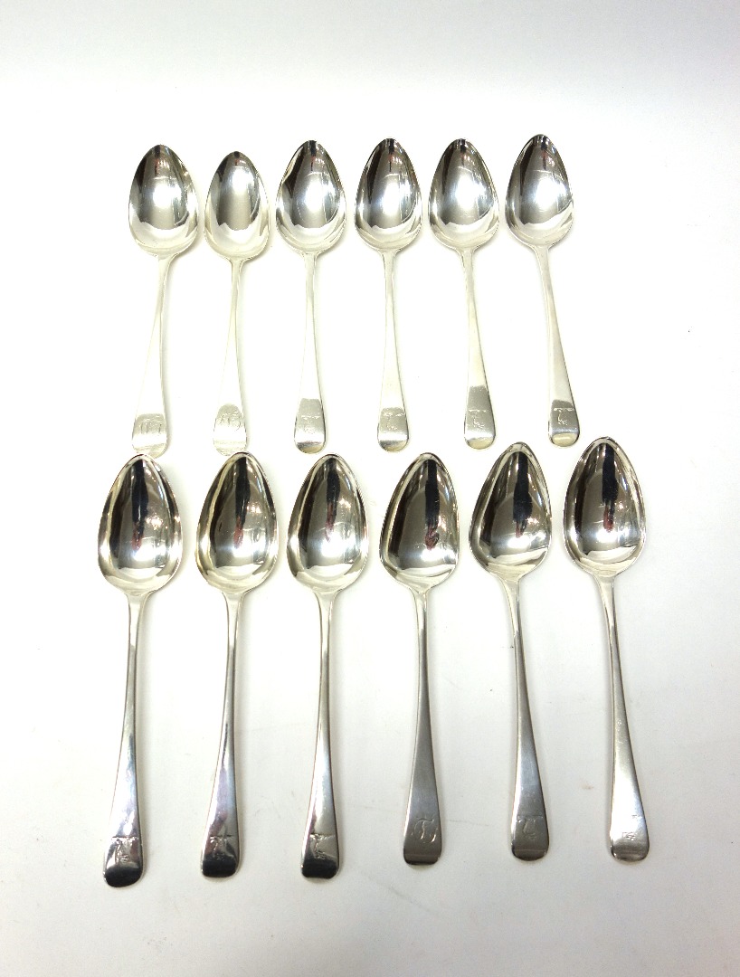 Appraisal: Twelve silver Old English pattern tablespoons comprising all London one