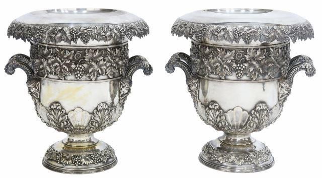 Appraisal: pair Sheffield silverplate urn-form champagne coolers removable liner revealing ice