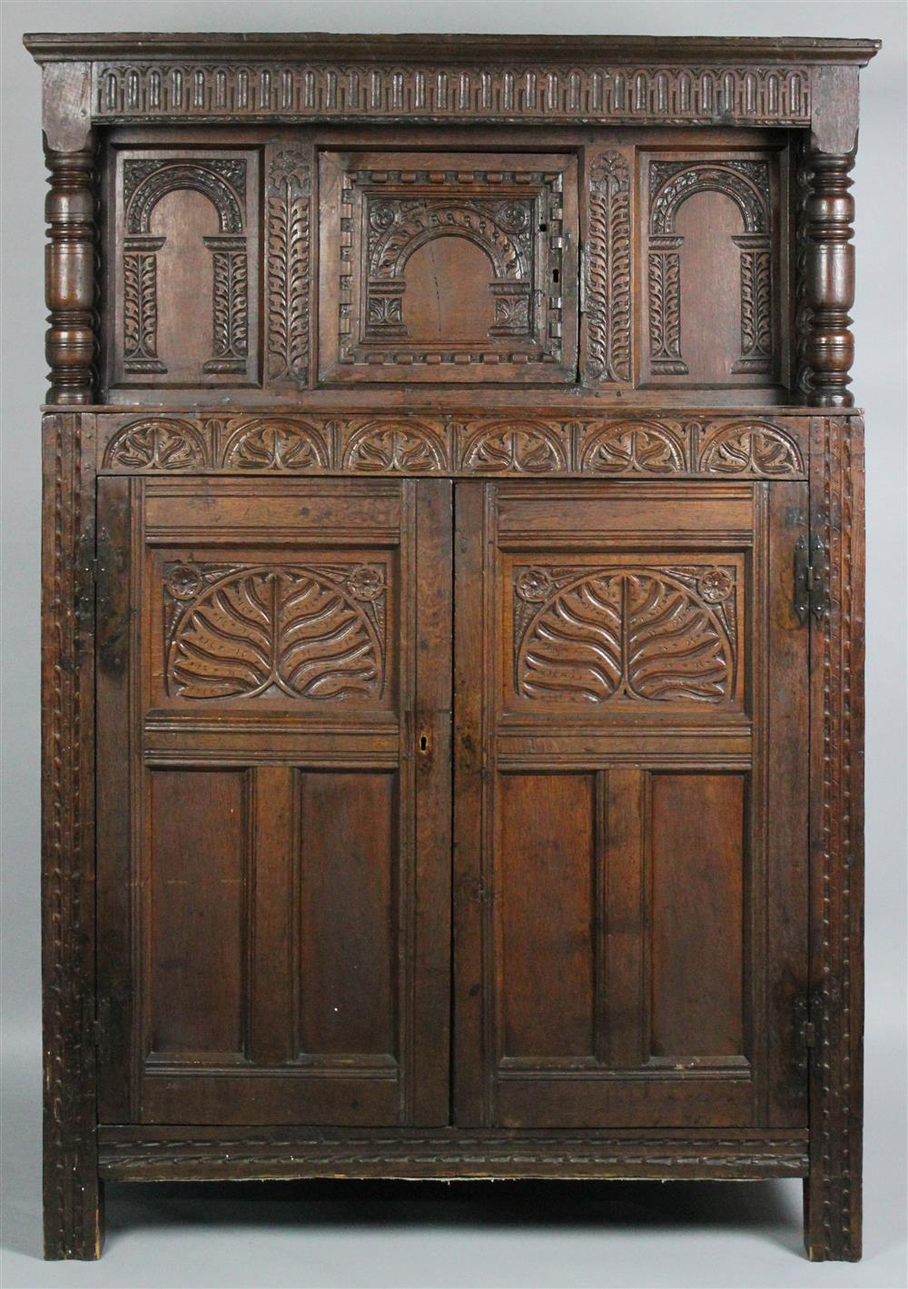 Appraisal: JACOBEAN CARVED OAK COURT CUPBOARD in two parts the step-back