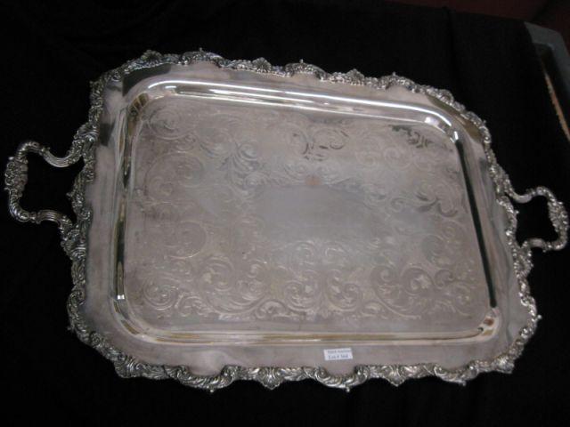 Appraisal: English Silverplate Tray handled footed elaborate design rococo border x