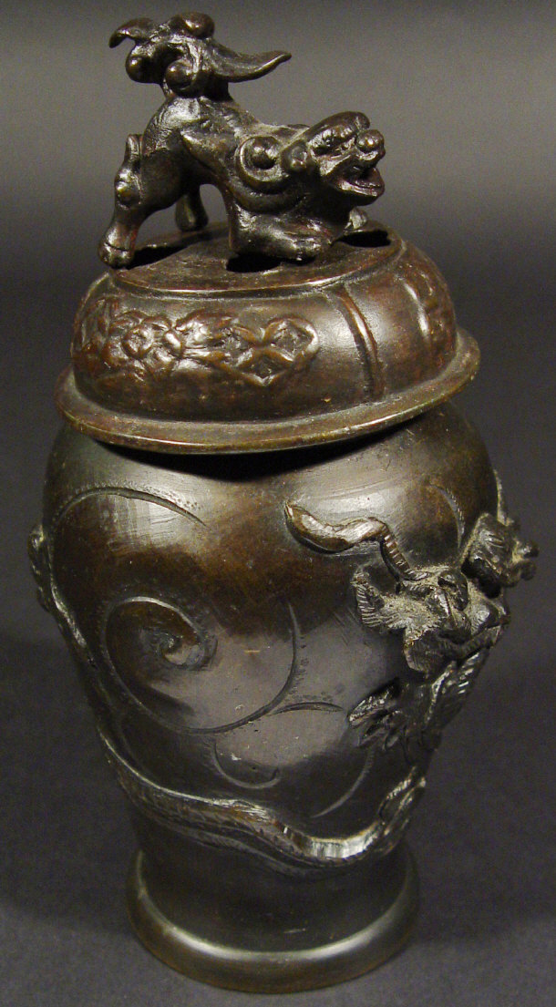 Appraisal: Japanese bronze vase and cover with dog of foo knop