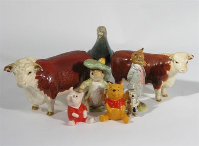 Appraisal: Winnie the Pooh' and 'Piglet' two Beswick Walt Disney figures