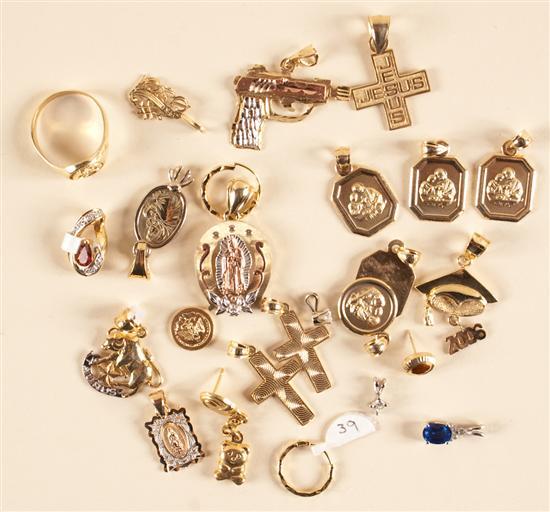 Appraisal: Assorted gold pendants and charms grams