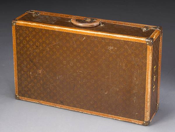 Appraisal: A Louis Vuitton hardcase suitcase first half th century height