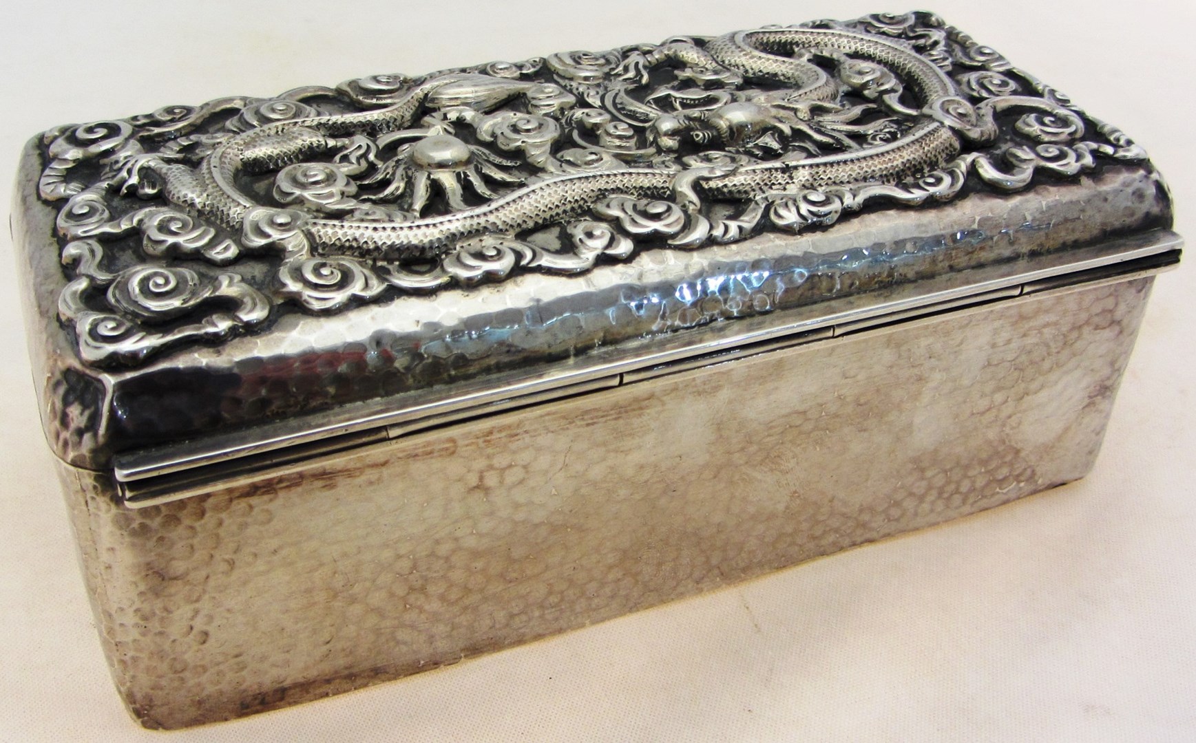 Appraisal: An Oriental rectangular table cigarette box the hinged cover decorated