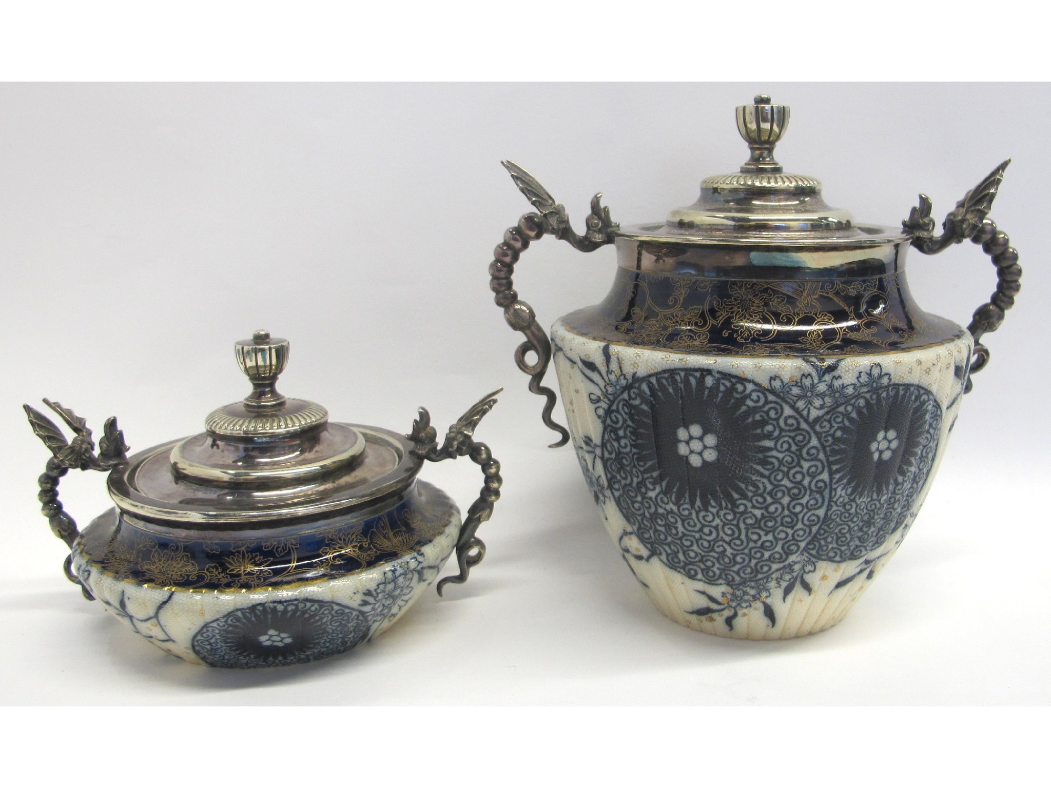 Appraisal: Two Royal Doulton porcelain and silvered metal covered jars