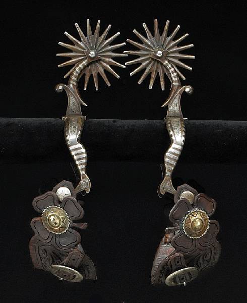 Appraisal: A pair of silver-mounted gal leg spurs by Elmer Miller