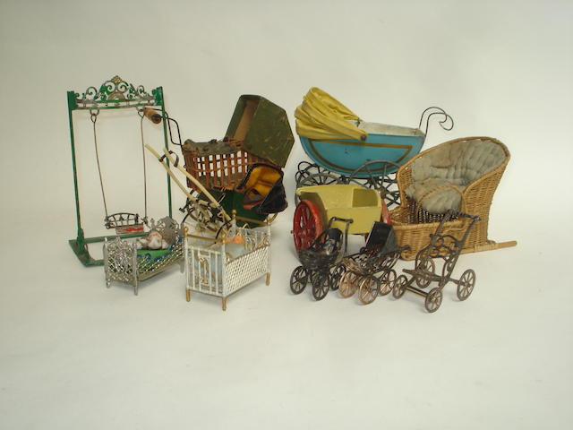 Appraisal: Miniature painted metal dolls pram The tin-plate pram in blue