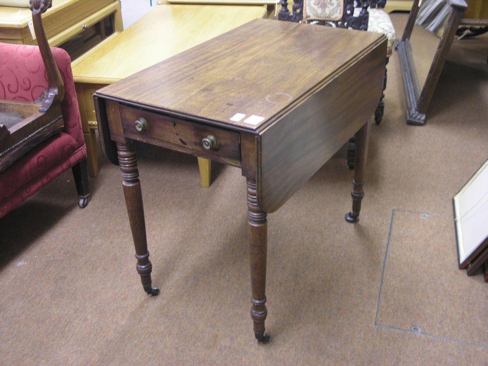 Appraisal: A late George III mahogany Pembroke table with two frieze