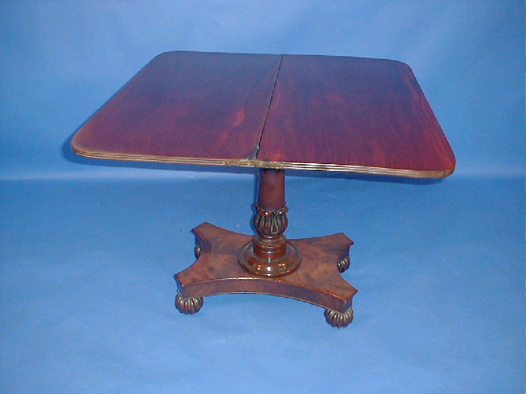 Appraisal: A William IV flamed mahogany tea table with rounded and