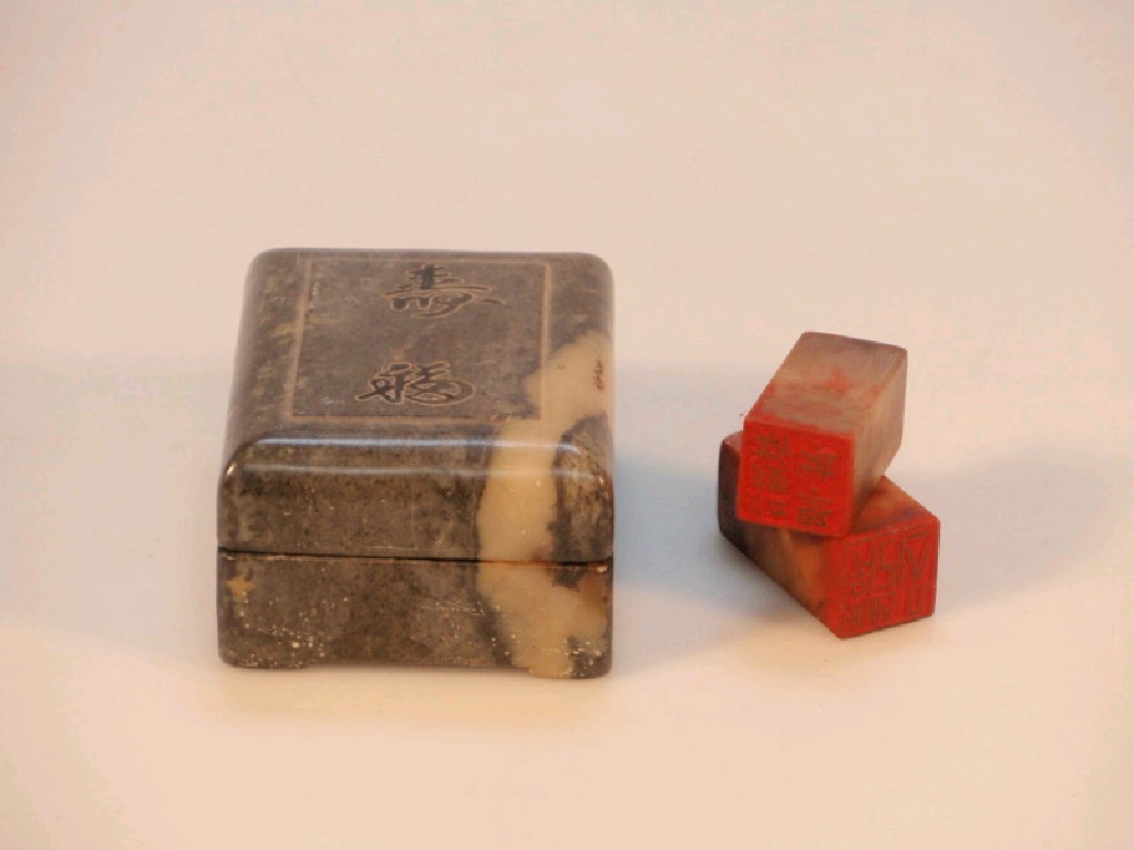 Appraisal: A Chinese soap stone seal box including two seals indicating