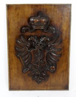 Appraisal: Relief carved walnut coat of arms with double headed eagle