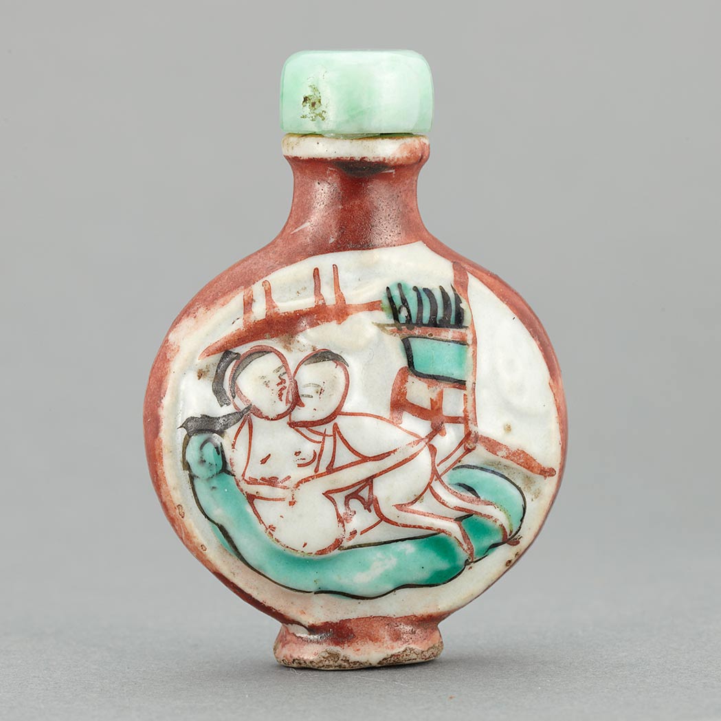 Appraisal: Chinese Porcelain Erotic Snuff Bottle Early th century Of compressed