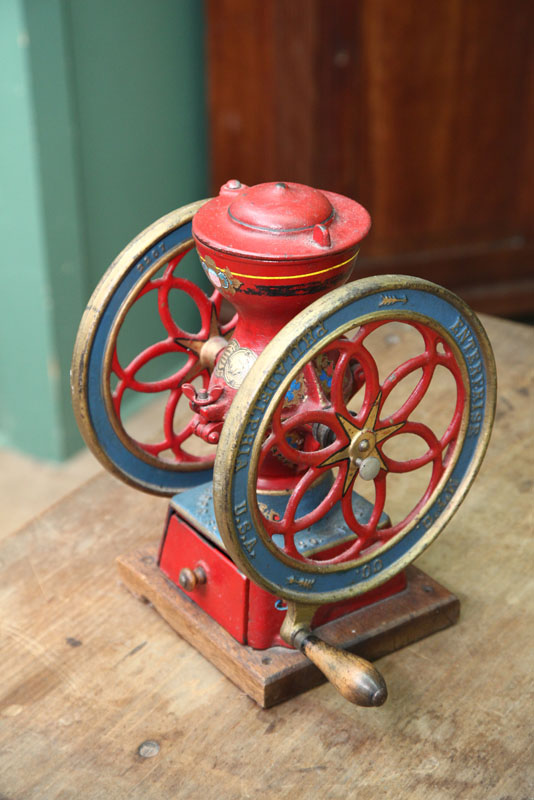 Appraisal: ENTERPRISE COFFEE GRINDER Counter top model with two cast iron