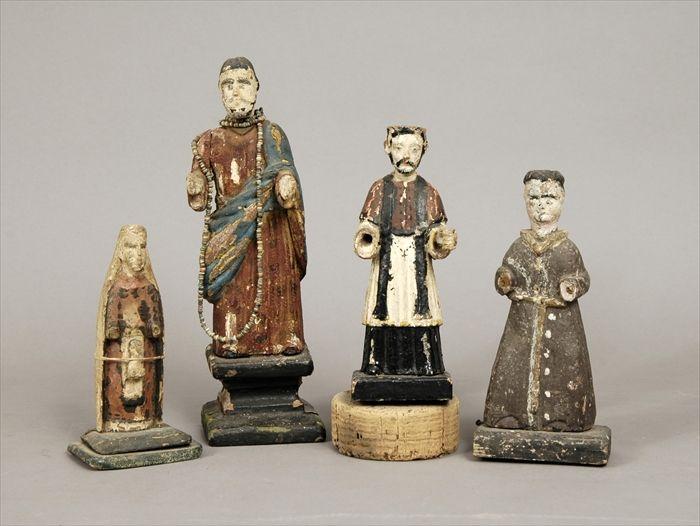 Appraisal: Four Polychrome Carved Wood Santos Figures to in Provenance The