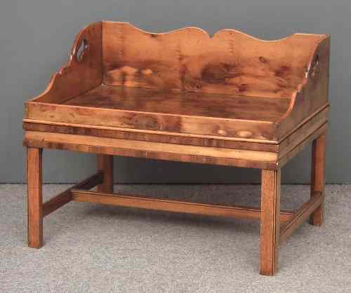 Appraisal: A modern yewwood finish butler's tray and stand of Georgian