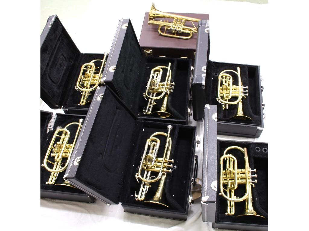 Appraisal: Five Jupiter brass cornets together with two Blessing brass cornets