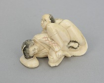 Appraisal: A Carved Ivory Netsuke of a Loving Couple ca th