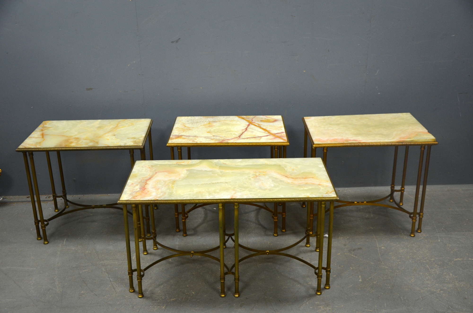 Appraisal: Four second half th C brass side tables with onyx