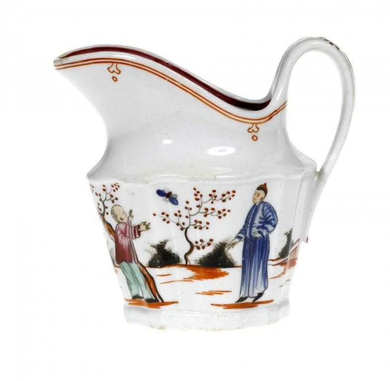 Appraisal: A NEW HALL CREAM JUG painted with three Chinese figures