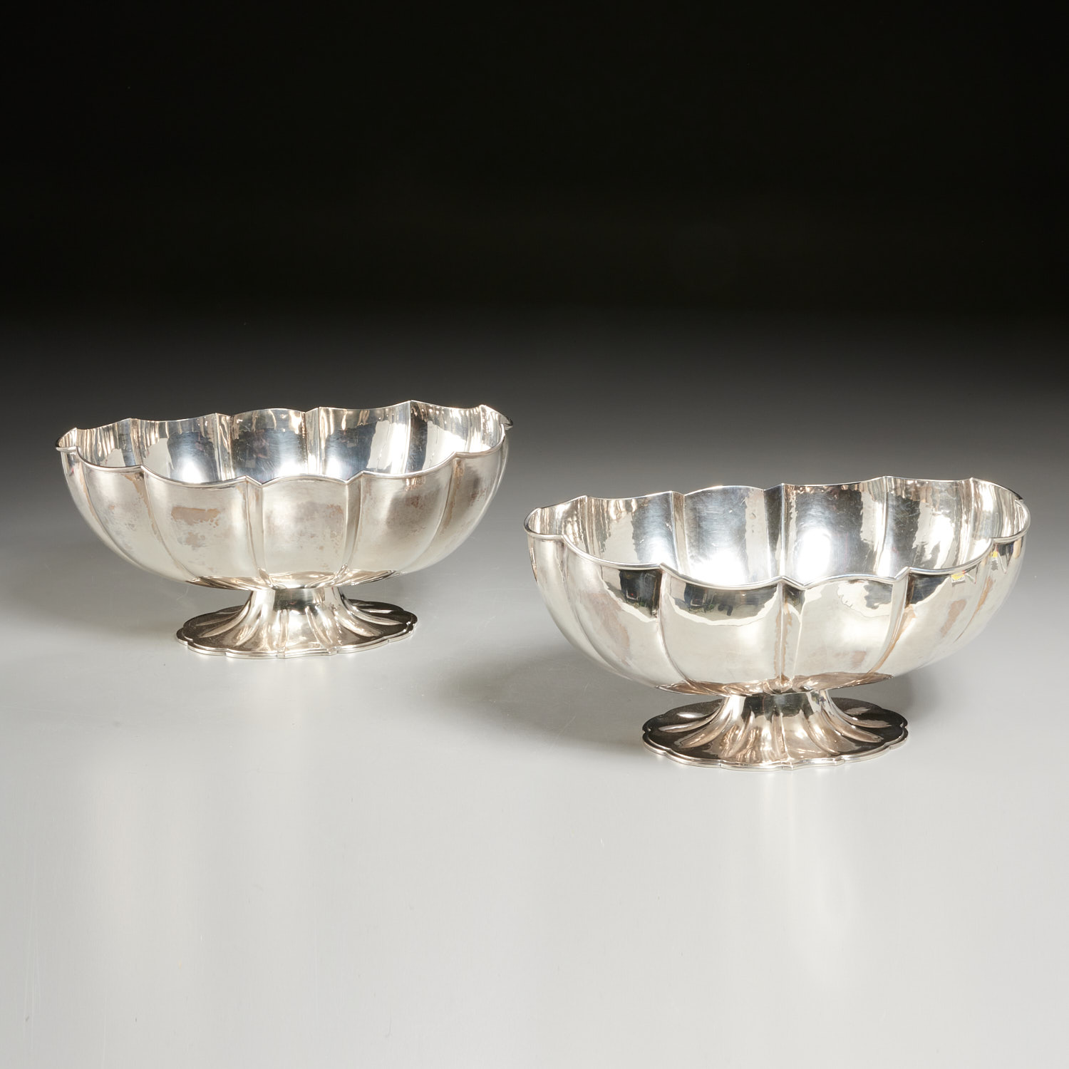 Appraisal: BUCCELLATI PAIR SILVER FOOTED BOWLS th c Italy cast and