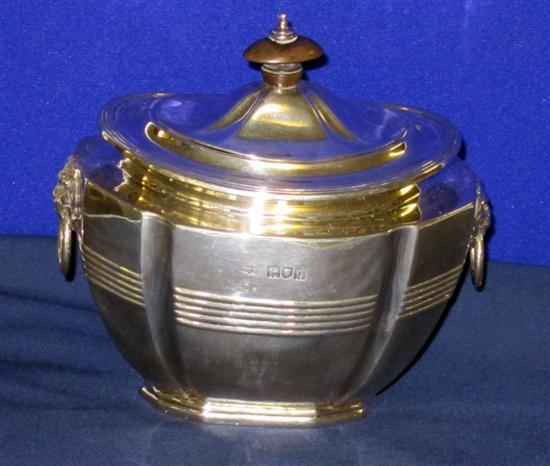 Appraisal: A Victorian oval silver tea caddy hinged top with applied