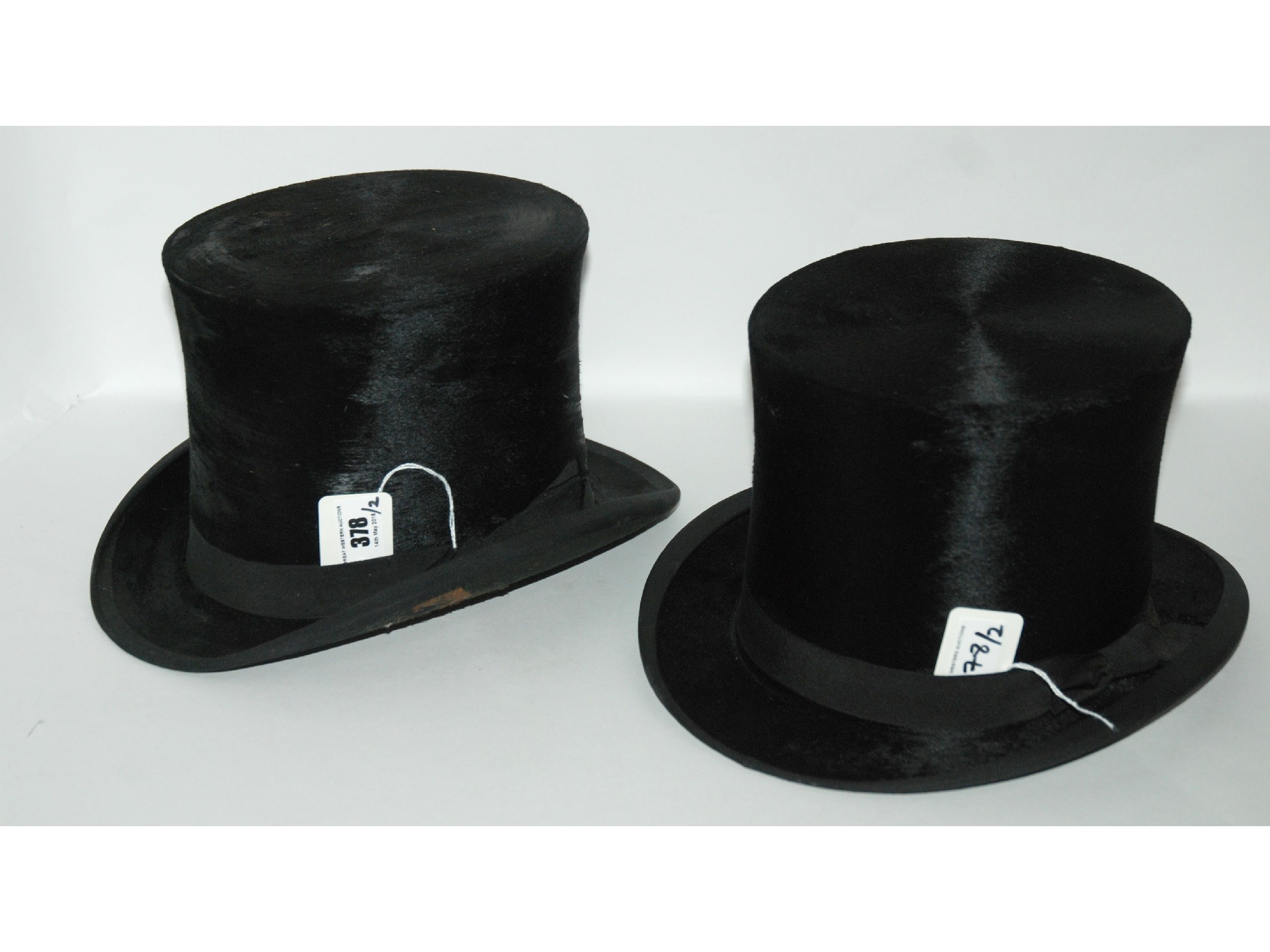 Appraisal: Two black silk top hats one in box