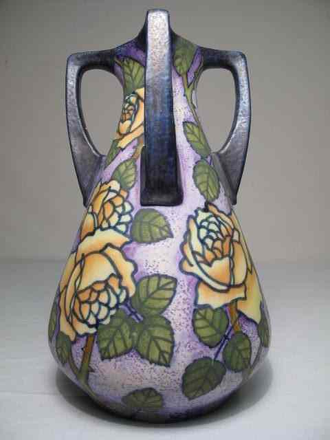 Appraisal: Czechoslovakian art pottery vase with bold rose design on a