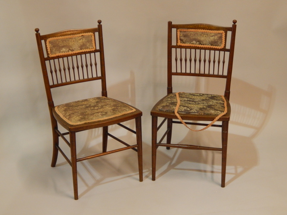 Appraisal: A pair of Edwardian inlaid bedroom chairs each with a