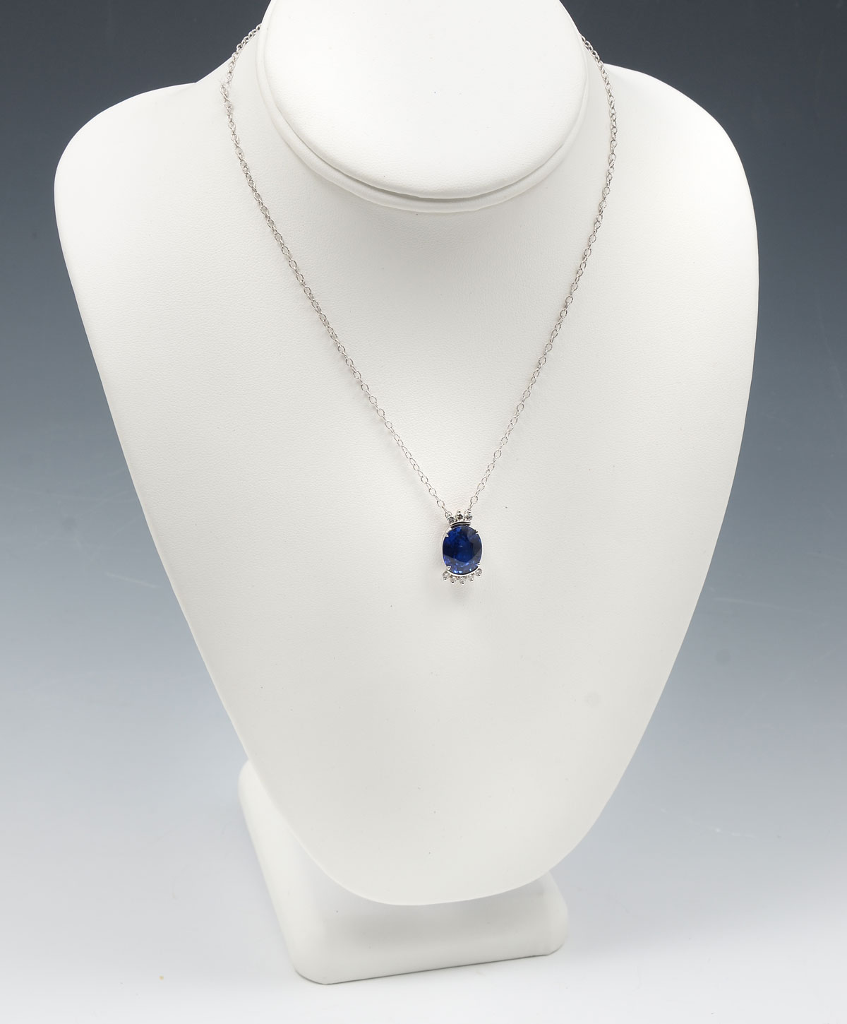 Appraisal: K SAPPHIRE DIAMOND PENDANT K white gold pendant contains one