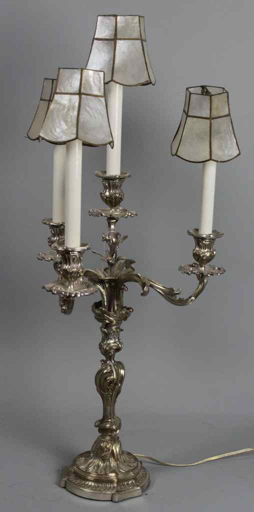 Appraisal: LOUIS XV STYLE SILVERED BRONZE CANDELABRUM With four candle holders