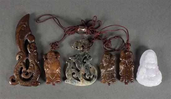 Appraisal: Six Chinese carved hardstone pendants and charms Estimate - No