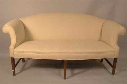 Appraisal: GEORGE III STYLE MAHOGANY SETTEE the arched padded back flanked