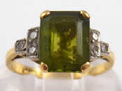 Appraisal: An carat gold peridot and diamond ring the peridot measuring