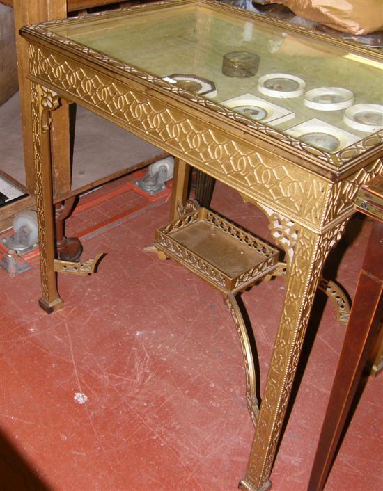 Appraisal: AN EDWARDIAN CHINESE CHIPPENDALE STYLE GILTWOOD VITRINE TABLE with shaped