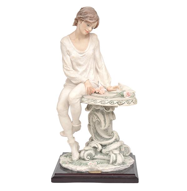 Appraisal: A GIUSEPPE ARMANI COMPOSITE FIGURE OF A GIRL READING CM