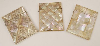 Appraisal: Three Victorian mother of pearl card cases with hinged covers