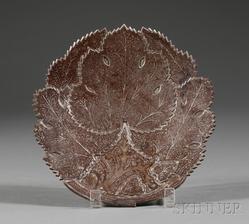 Appraisal: Iron Plaque India th century overlapping leaf form surface inlaid