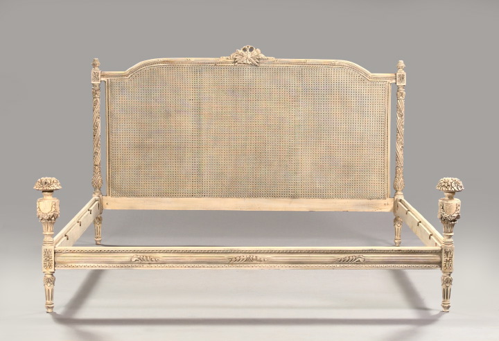 Appraisal: Louis XVI-Style Polychromed and Caned King-Size Bedstead the expansive headboard