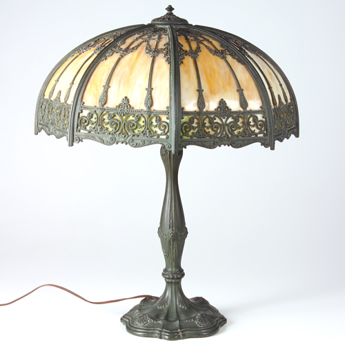 Appraisal: Art glass table lamp with bronzed base and faceted domed